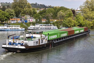 Container ship travelling on the Neckar, in the background the Wilhelma landing stage, excursion