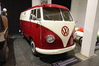 A red and white Volkswagen T1 bus on display in the museum, AUTOMUSEUM PROTOTYP, Hamburg, Hanseatic