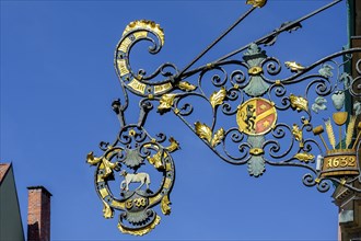 Wrought iron nose shield from 1632 with coat of arms and lamb, Kaufbeuern, Allgaeu, Swabia,