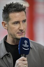 TV expert Miroslav Klose in an interview, microphone, microphone, logo, portrait, Champions League