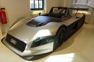 AUDI R8R LMP Prototype, A silver Audi sports car presented in a showroom, AUTOMUSEUM PROTOTYP,