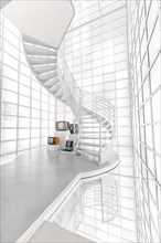 Futuristic white staircase with curved lines in an interior, Deutsche Kinematik, Berlin, Germany,