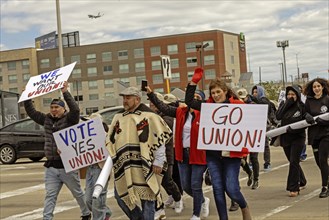 Rosemont, Illinois, Hundreds of workers and supporters picketed a Portillo's restaurant, demanding