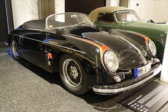 Porsche 356 A SPEEDSTER, Black vintage Porsche sports car presented in an exhibition, AUTOMUSEUM