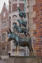 The Bremen Town Musicians as a bronze statue by Gerhard Marcks at the historic town hall in Bremen,