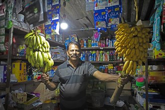 Kiosk vendor in Kavanattinkara, Backwaters, Kerala, India, Asia