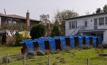 Row of blue beach chairs in a front garden, Ruegen, Mecklenburg-Vorpommern, Germany, Europe
