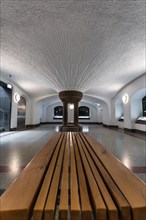 Interior with bench and unique ceiling texture, symmetrical and calm, Botanical Garden, Berlin,