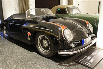 PORSCHE 356 A SPEEDSTER, Elegant black Porsche Cabriolet vintage car in an exhibition, AUTOMUSEUM