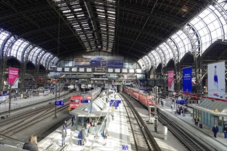 Hamburg Central Station, Hamburg, Germany, Europe, Interior view of a busy railway station with