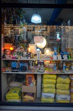 Chaotic display in the window of a DIY store in Buenos Aires, Argentina, South America