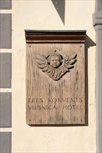 Lettering Ekes Konvent on a wooden sign, was a convent for impoverished widows and fallen girls in