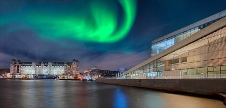 Opera and historic warehouse night Northern Lights Oslo Norway