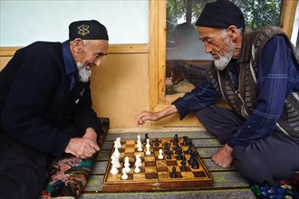 Uzbek men, playing chess, Kyrgyzstan, Asia