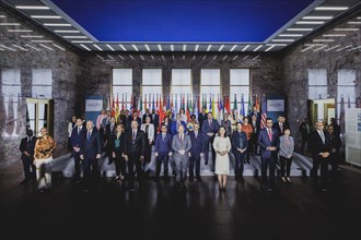 Family photo, taken during the Petersberg Climate Dialogue in Berlin, 26.04.2024. / Photographed on