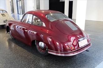 Rear view of a red Porsche 356 Coupe, exhibited in a car museum, AUTOMUSEUM PROTOTYP, Hamburg,