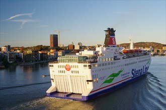 Car ferry travelling between Denmark and Sweden arrives at the harbour, Eriksberg, Gothenburg,