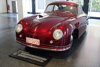 A red Porsche 356 Coupe on display, view of the front of the historic car, AUTOMUSEUM PROTOTYP,