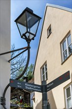 Lantern and signpost, Kaufbeuern, Allgaeu, Swabia, Bavaria, Germany, Europe