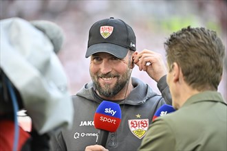 Coach Sebastian Hoeness VfB Stuttgart, portrait, smiles, in an interview, microphone, microphone,