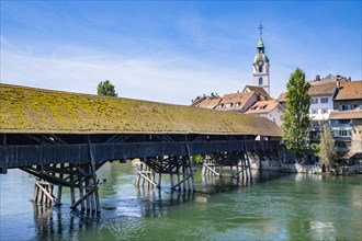 View of an old wooden bridge with an old town in the background, Olten, Solothurn, Switzerland,