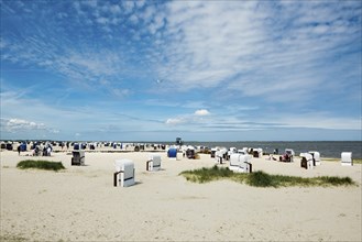 Beach chairs on the sandy beach, Harlesiel, Carolinensiel, East Frisia, Lower Saxony, Germany,