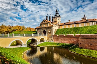 Belarusian tourist landmark attraction Nesvizh Castle, medieval castle in autumn. Nesvizh, Belarus,