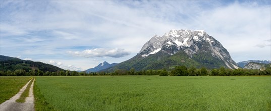 Field path near a meadow, behind the Grimming, panoramic view, near Irdning, Styria, Austria,