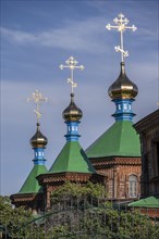 Russian Orthodox Church Cathedral of the Holy Trinity, wooden church with green spires, Karakol,