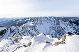 View from the summit of the Aiplspitz in winter, snow-covered mountain landscape with Jaegerkamp