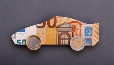 Symbol photo, a car, sports car, built from European banknotes, euro, AI generated, AI generated