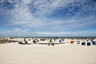 Beach chairs on the sandy beach, Harlesiel, Carolinensiel, East Frisia, Lower Saxony, Germany,