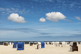 Beach chairs on the sandy beach, Harlesiel, Carolinensiel, East Frisia, Lower Saxony, Germany,