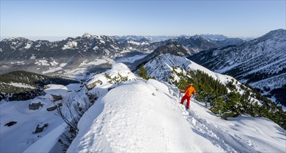Mountaineer on the summit of the Aiplspitz in the snow, snow-covered mountain landscape with