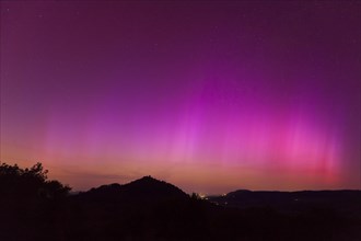 Northern lights in southern Germany. Very strong auroras over the Limburg near Weilheim, Swabian
