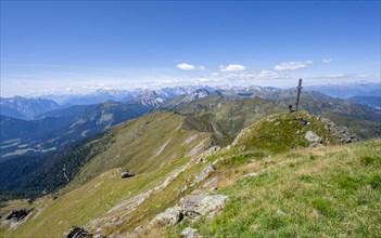 Summit of the Hochspitz or Monte Vacomun, view of the mountain ridge of the Carnic Main Ridge,