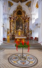 Gilded baroque altar with Advent wreath, interior view of the Catholic parish church, Minster of