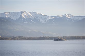 Excursion boat on Lake Constance, snow-covered mountain peaks, Lindau Island, Lake Constance,