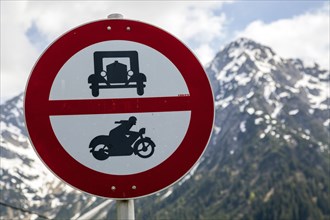 Prohibition signs for cars and motorbikes with vintage car symbols, near Mittelberg,
