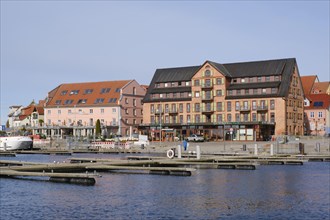 Hotel and restaurants at the harbour on Lake Mueritz, Waren, Mueritz, Mecklenburg Lake District,