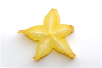 Star fruit or carambola (Averrhoa carambola), sliced fruit on a white background