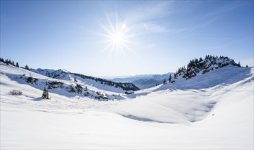 Snow-covered mountain landscape in winter at the Schnittlauchmoosalm, Sonnenstern, ski tour to the