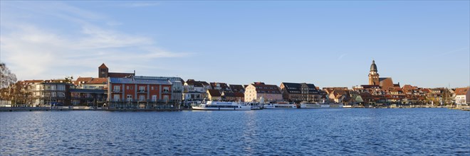 Town panorama with town harbour on Lake Mueritz, St. Georgen Church and St. Marien Church, Waren,