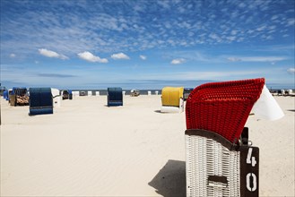 Beach chairs on the sandy beach, Harlesiel, Carolinensiel, East Frisia, Lower Saxony, Germany,