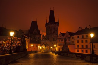 Charles Bridge towards the Lesser Town at night and in the fog