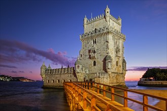 Belem Tower or Tower of St Vincent famous tourist landmark of Lisboa and tourism attraction on bank