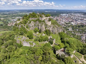 Aerial view of the Hohentwiel volcanic cone with Germany's largest fortress ruins, behind it the