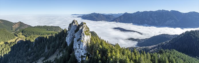 Aerial view, rocky summit of the Ettaler Manndl, view over mountain landscape and sea of clouds,