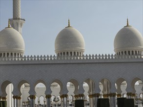 Close up of mosque domes and arches, highlighted by daylight, showing ornate details, beautiful