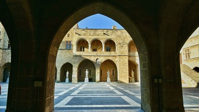 Sunlit inner courtyard of a castle with symmetrical shadow plays, archway, inner courtyard, Grand